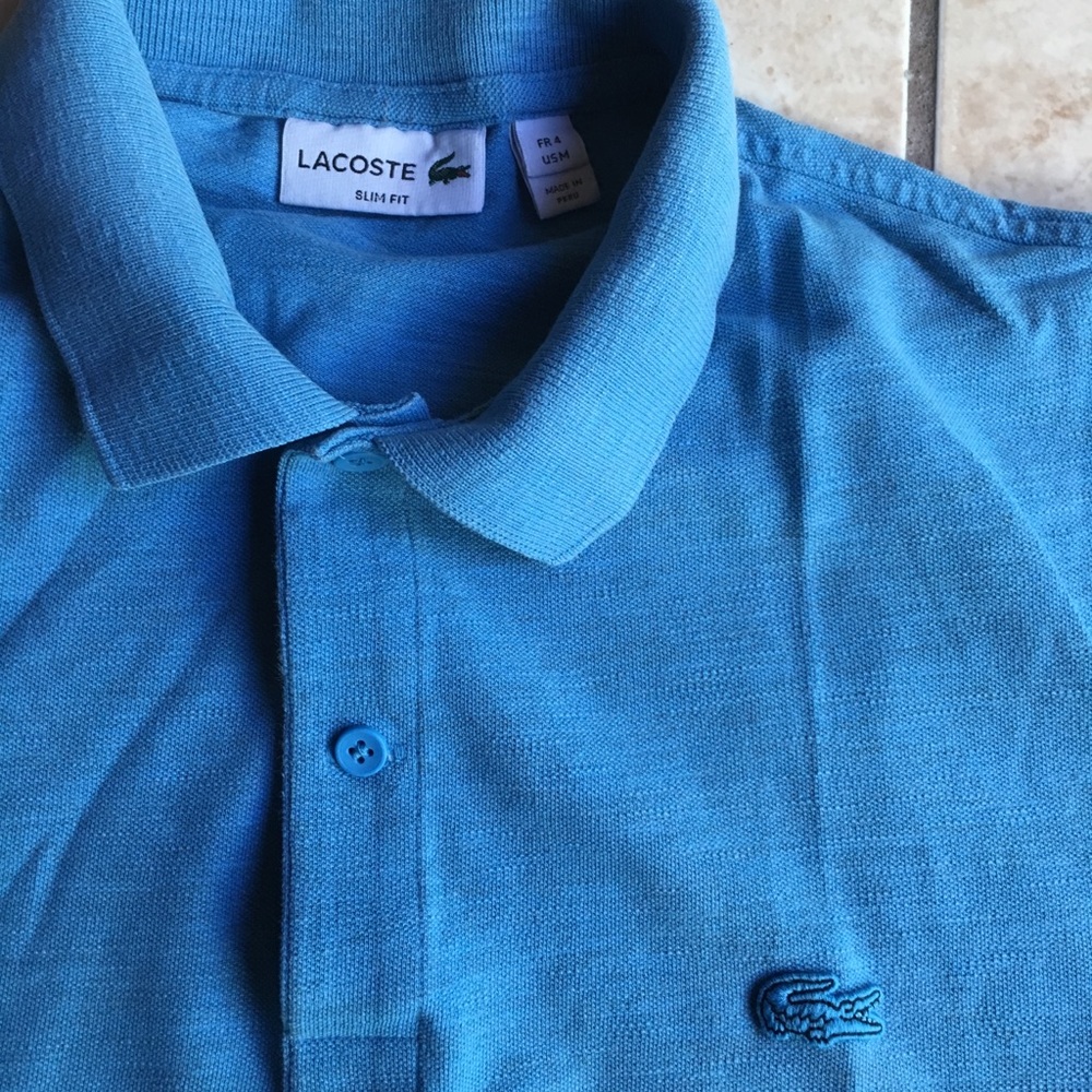 Lacoste men’s slim fit blue polo shirt.